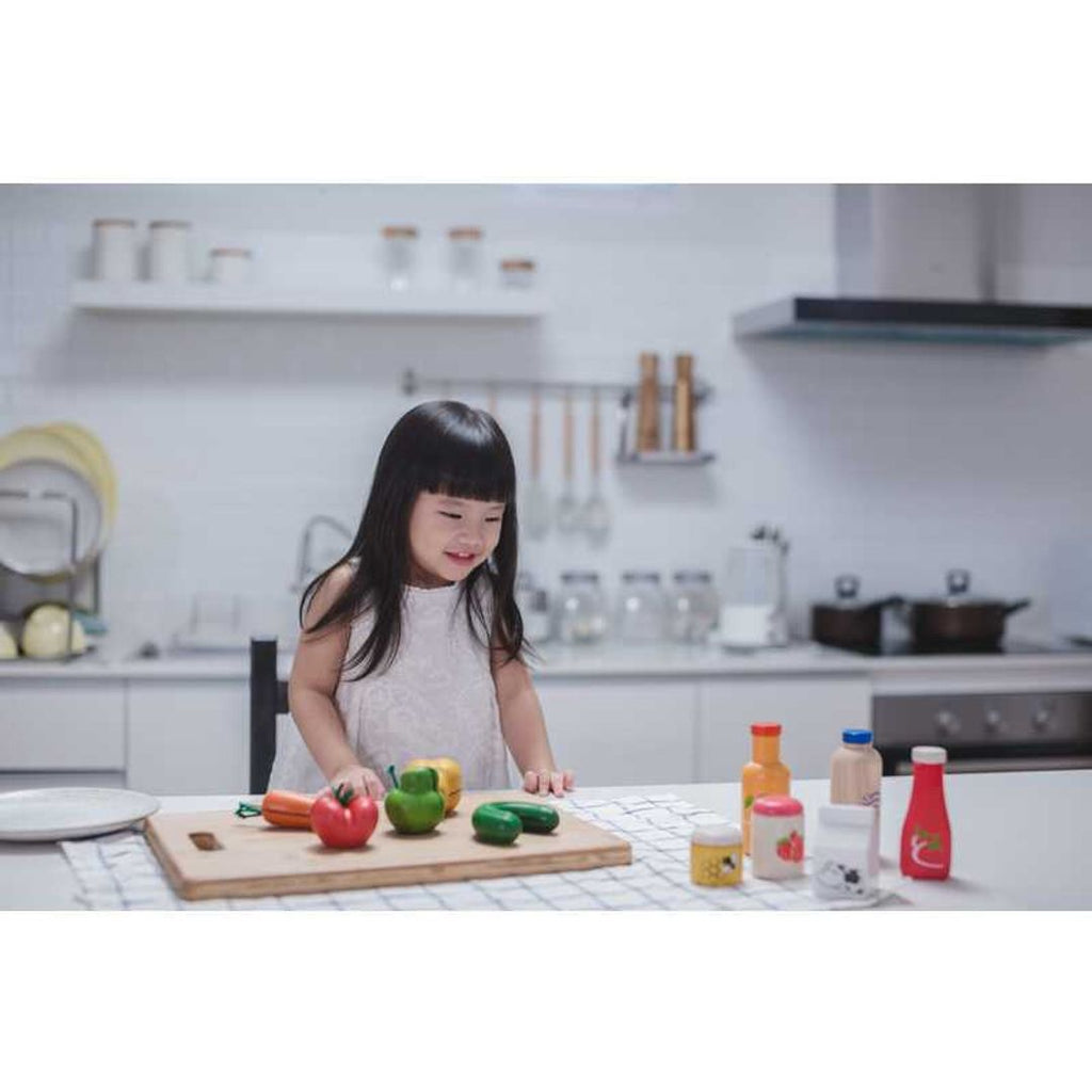 Kid playing PlanToys Food & Beverage Set