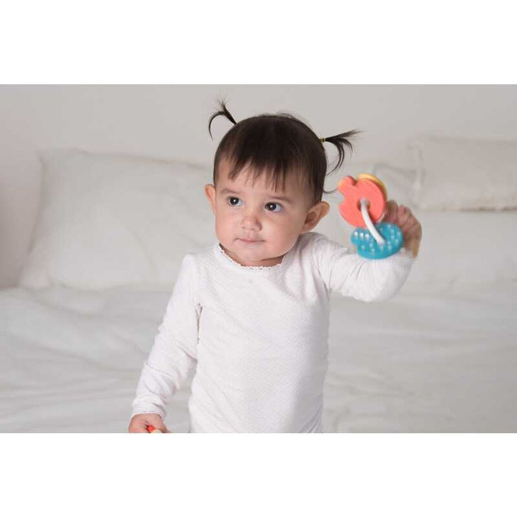 Kid playing PlanToys Baby Key Rattle