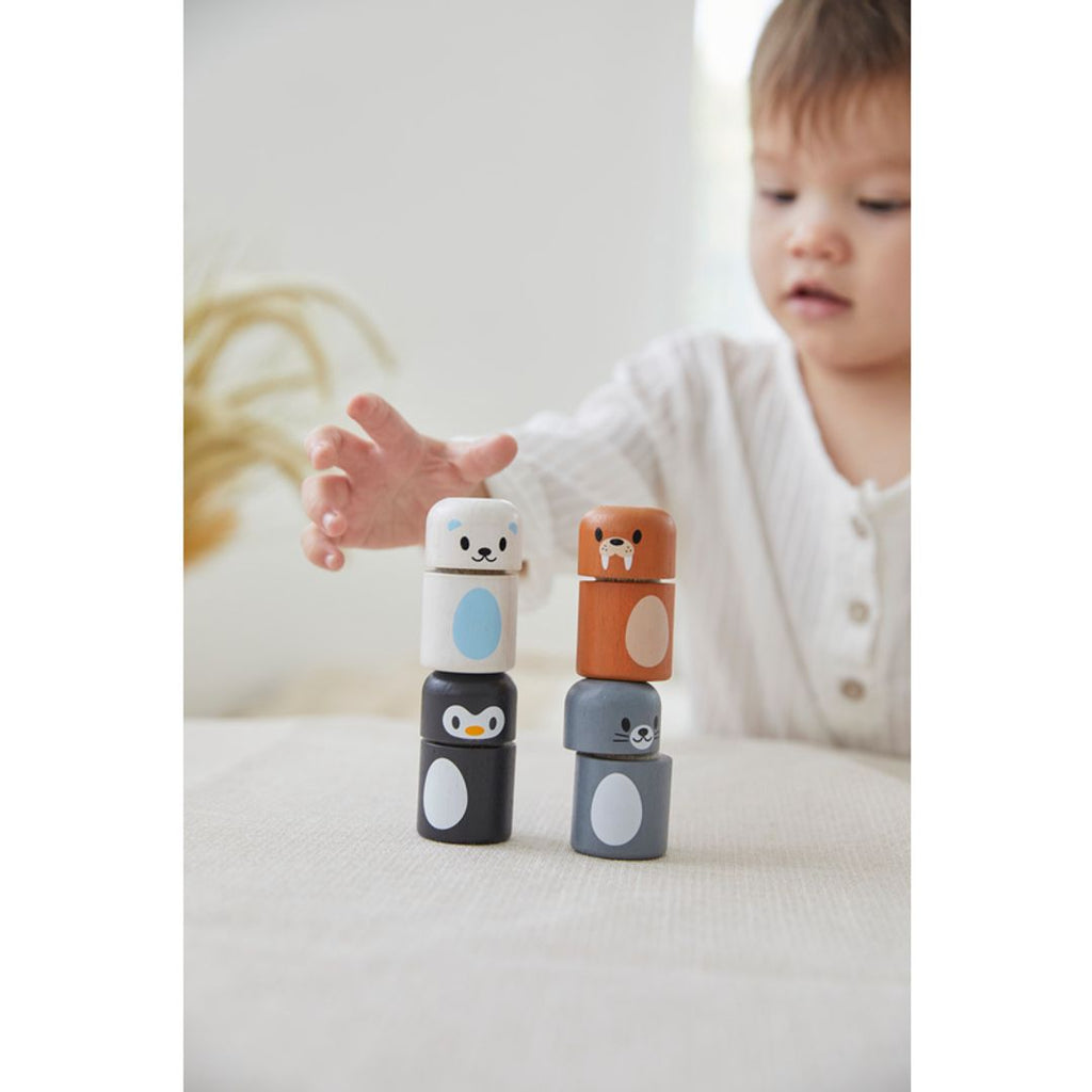 Kid playing PlanToys Arctic Animal Matching