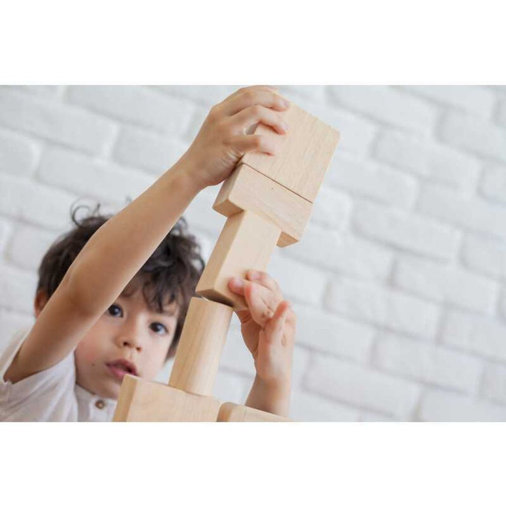 Kid playing PlanToys 50 Unit Blocks