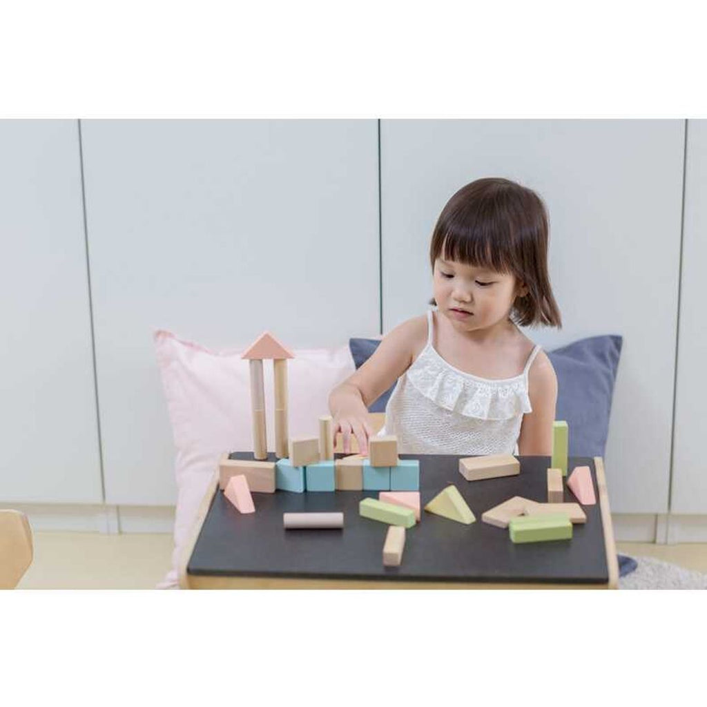 Kid playing PlanToys 40 Unit Blocks - Pastel Series